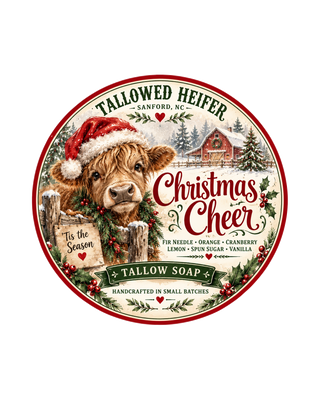 Christmas Cheer label with a Highland cow in a Santa hat, handmade grass-fed tallow soap by Tallowed Heifer